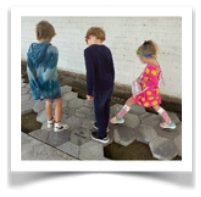 Children at site of bee wall mural