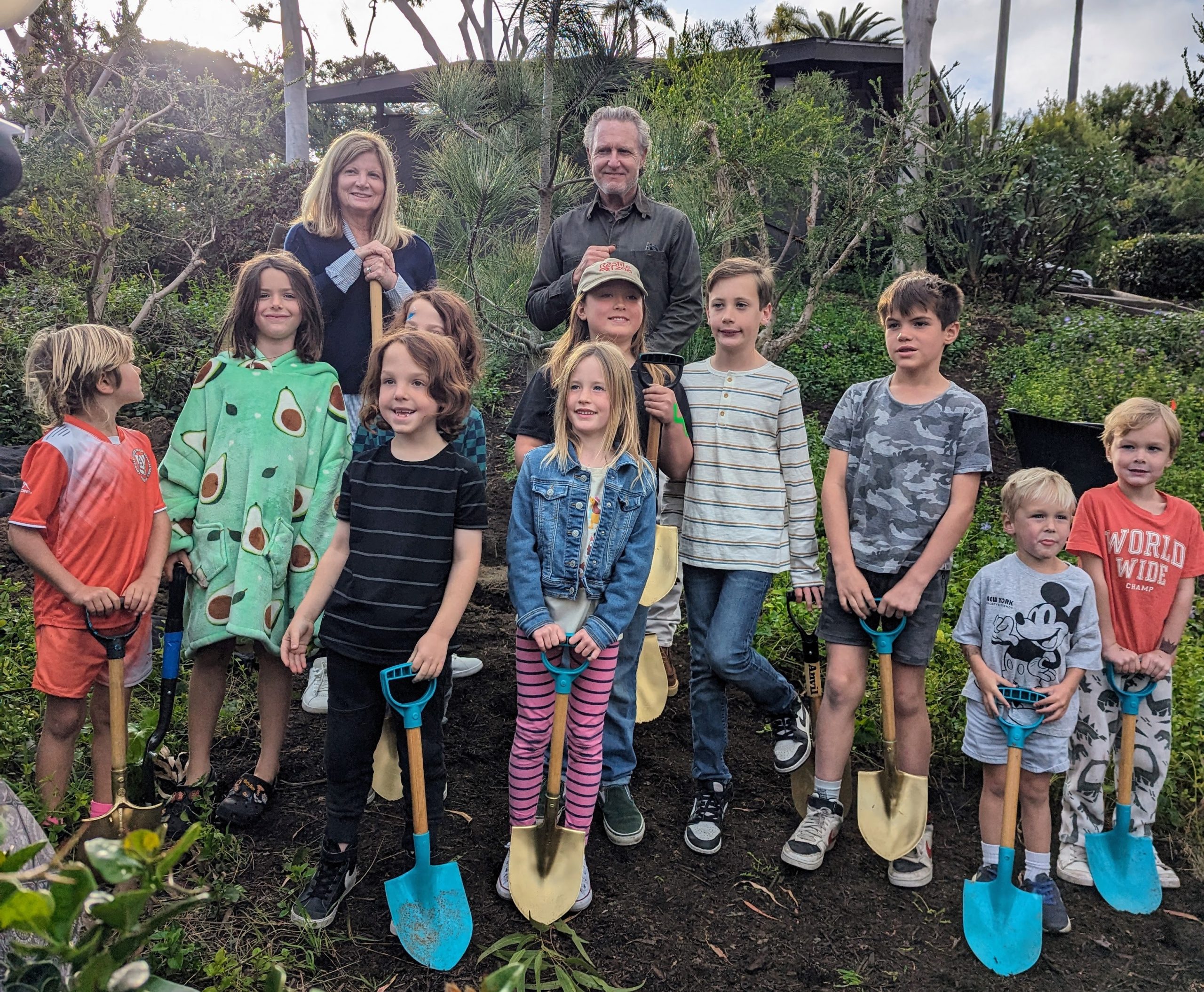 Children planting a tree in Boat Canyon Park for Arbor Day Celebration