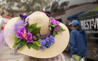 Mary Hurlbut's photo of Gate & Garden Tour visitor in garden hat